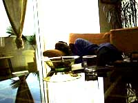 husband on sofa.  90's family